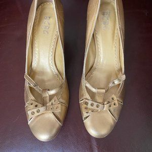 BCBG  PARIS    SIZE  9  HEELED   GOLD  COLOR  SHOES.